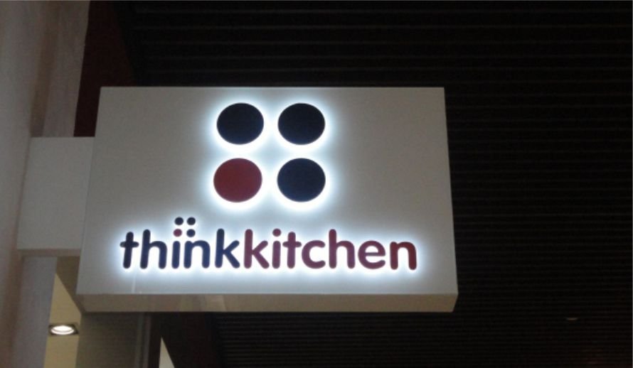 Backlit acrylic LED sign board for ThinkKitchen retail store by LED sign board manufacturers in Hyderabad, Jubilee Hills.
