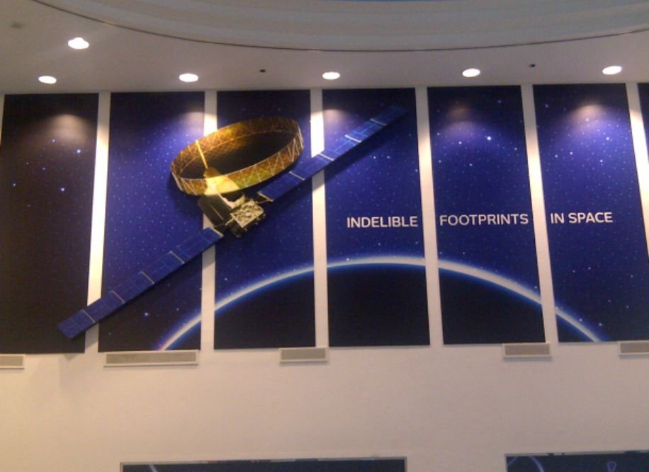 Large-format wall graphics with custom corporate branding and signage solutions in Hyderabad, Kondapur.