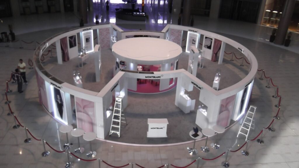 Custom exhibition stall design with illuminated branding and display solutions in Hyderabad, Kukatpally.