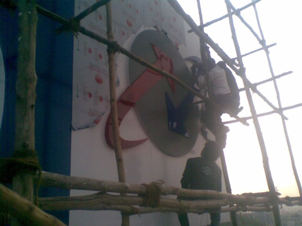 Custom corporate logo with acrylic LED sign board installation for commercial branding in Hyderabad, Jubilee Hills.
