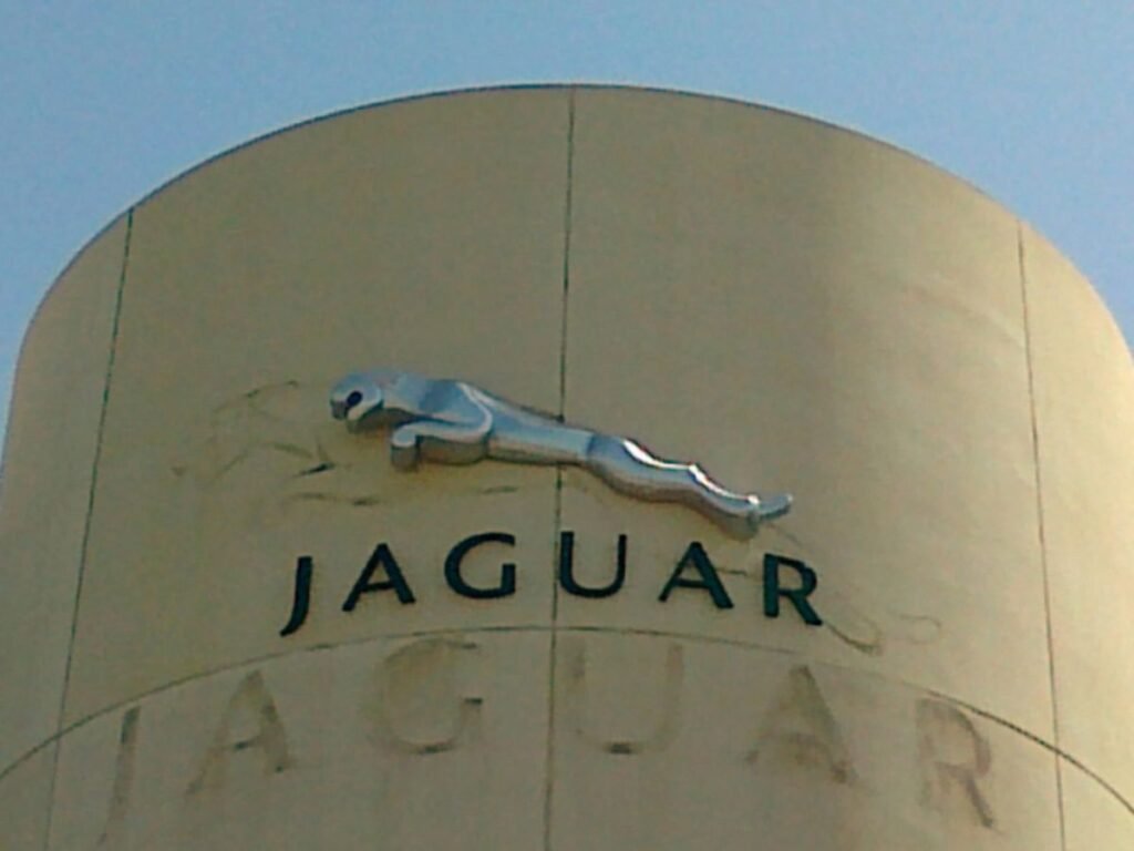 Premium Jaguar showroom signage with 3D acrylic logo and illuminated branding in Hyderabad, Jubilee Hills.
