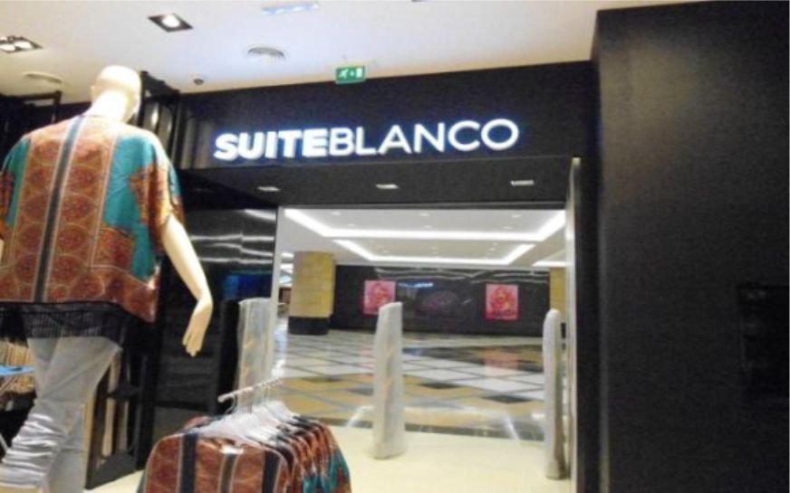 Modern LED light sign board with illuminated channel letters for SuiteBlanco store in Hyderabad, Kondapur.