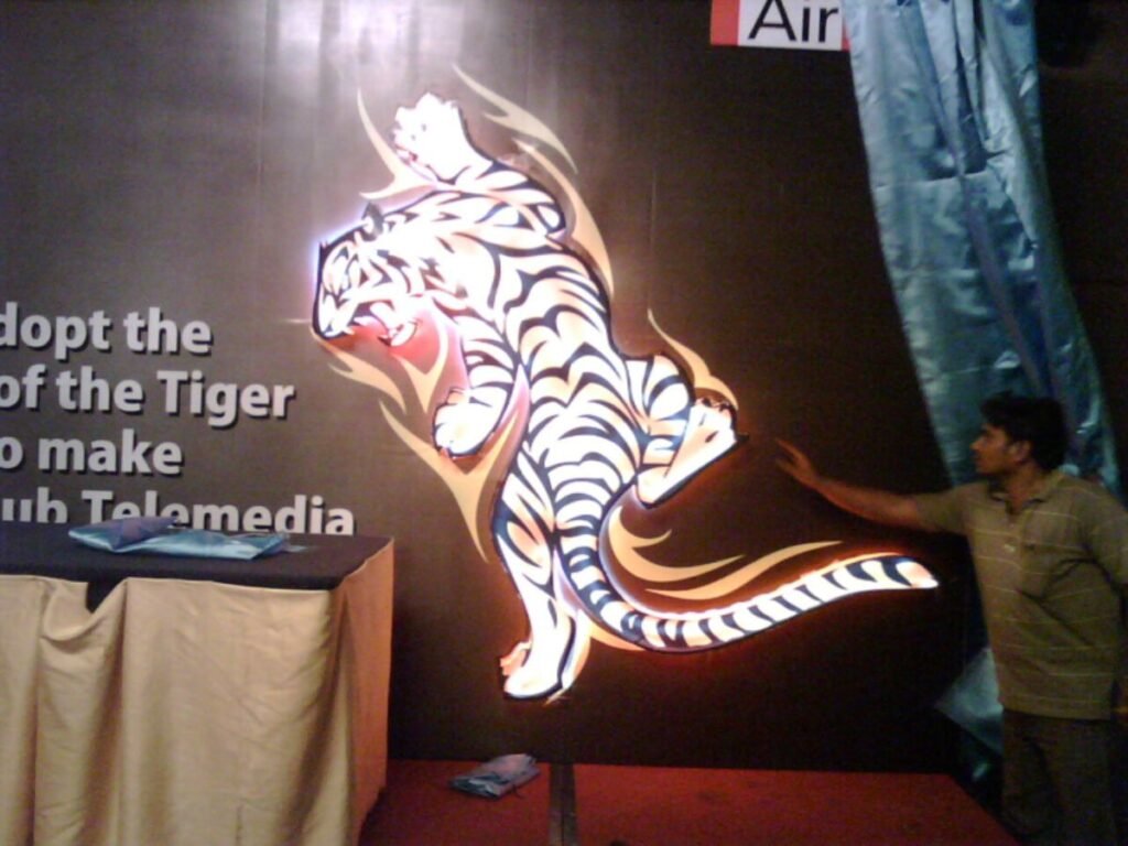 Custom illuminated display graphic and LED branding panel for commercial interiors in Hyderabad, HITEC City.