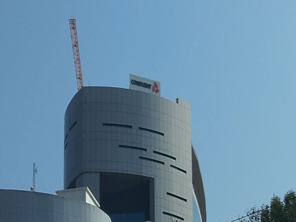 Corporate rooftop LED sign installation by Sina Interior & Signage in Hyderabad using weatherproof illuminated channel letters.