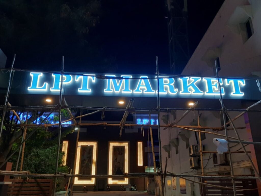 Front-lit LED channel letter signage for LPT Market installed by Sina Interior & Signage in Hyderabad for commercial shopping centers.